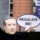 An activist of environmental NGO Avaaz wearing a mask depicting Facebook CEO Mark Zuckerberg holds a banner reading “Regulate me” during an action marking the release of the Digital Services Act, outside the European Commission building in Brussels on December 15, 2020.
